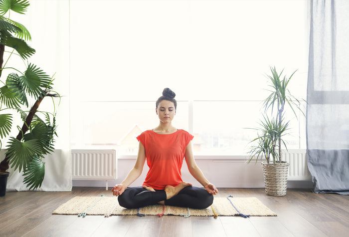 Yoga Poses To Ease PMS Symptoms