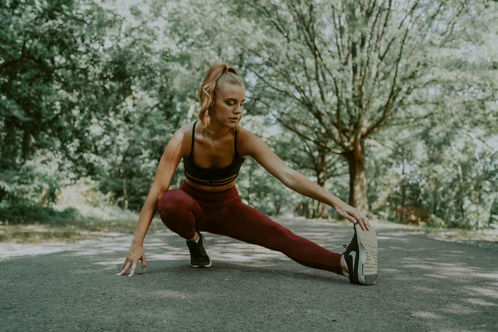 A woman doing lunges.
