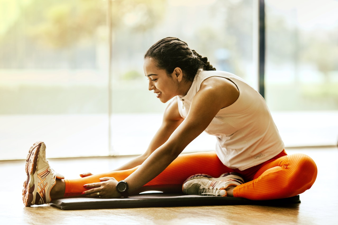 Woman doing stretching exercises