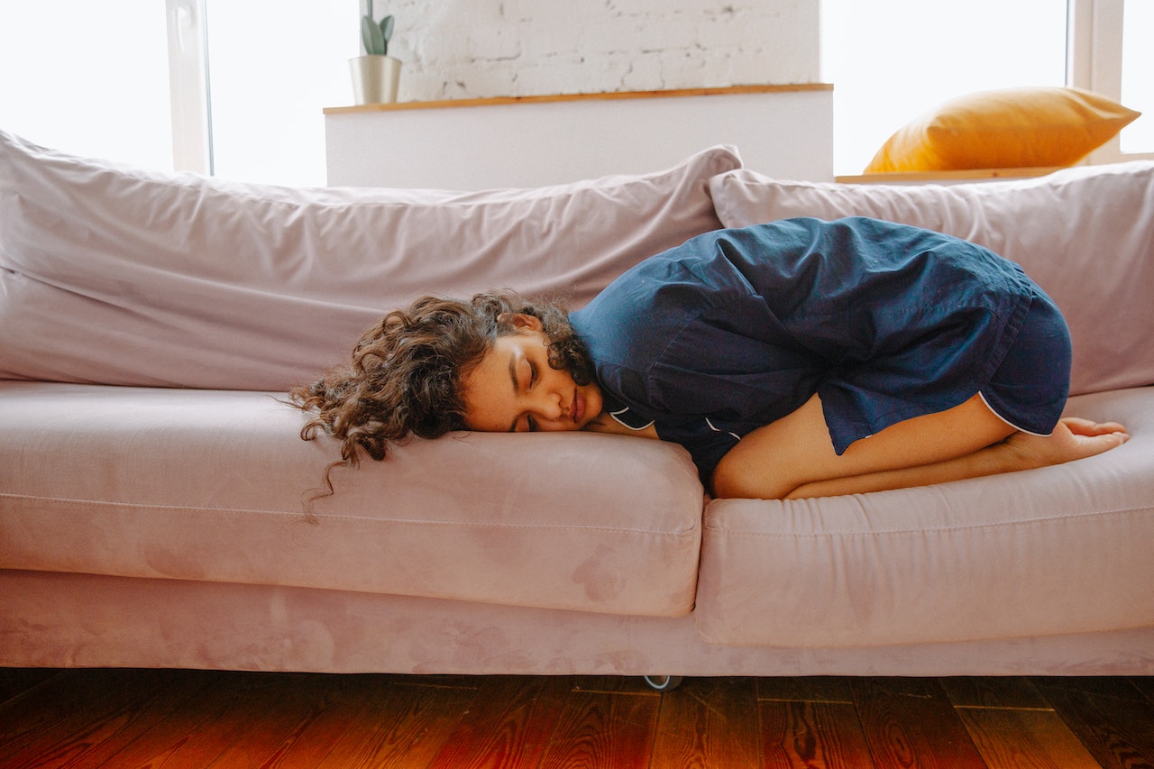 Woman lying on the couch