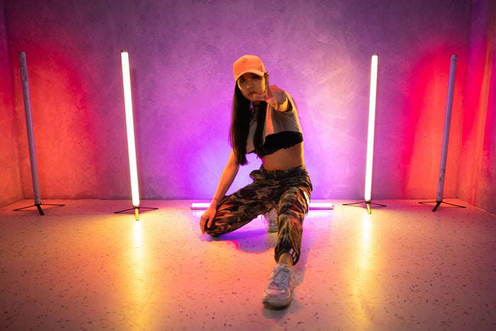 Dancer performing in a brightly-colored space